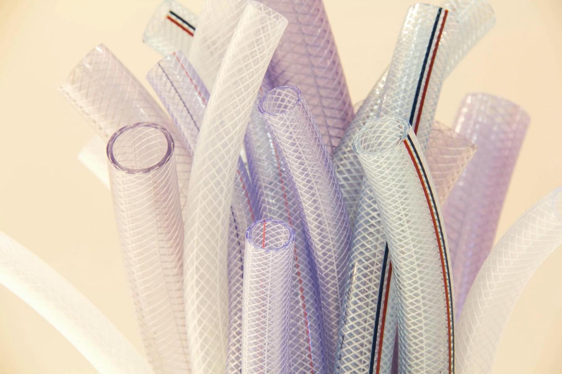 Clear reinforced PVC extruded profiles and tubing