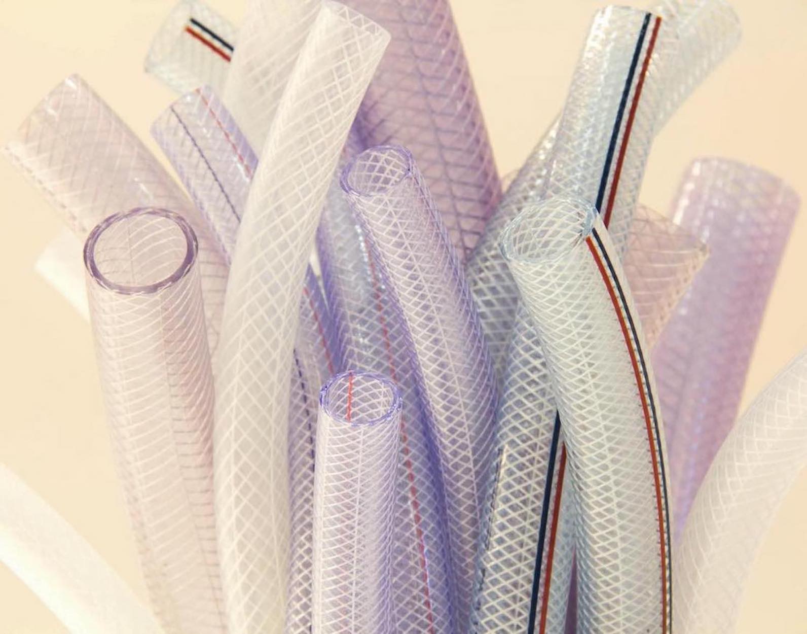 Braided PVC hose extrusions supplied by a UK PVC extrusion supplier