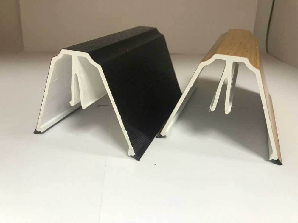 Black and beige rigid plastic extrusion profiles